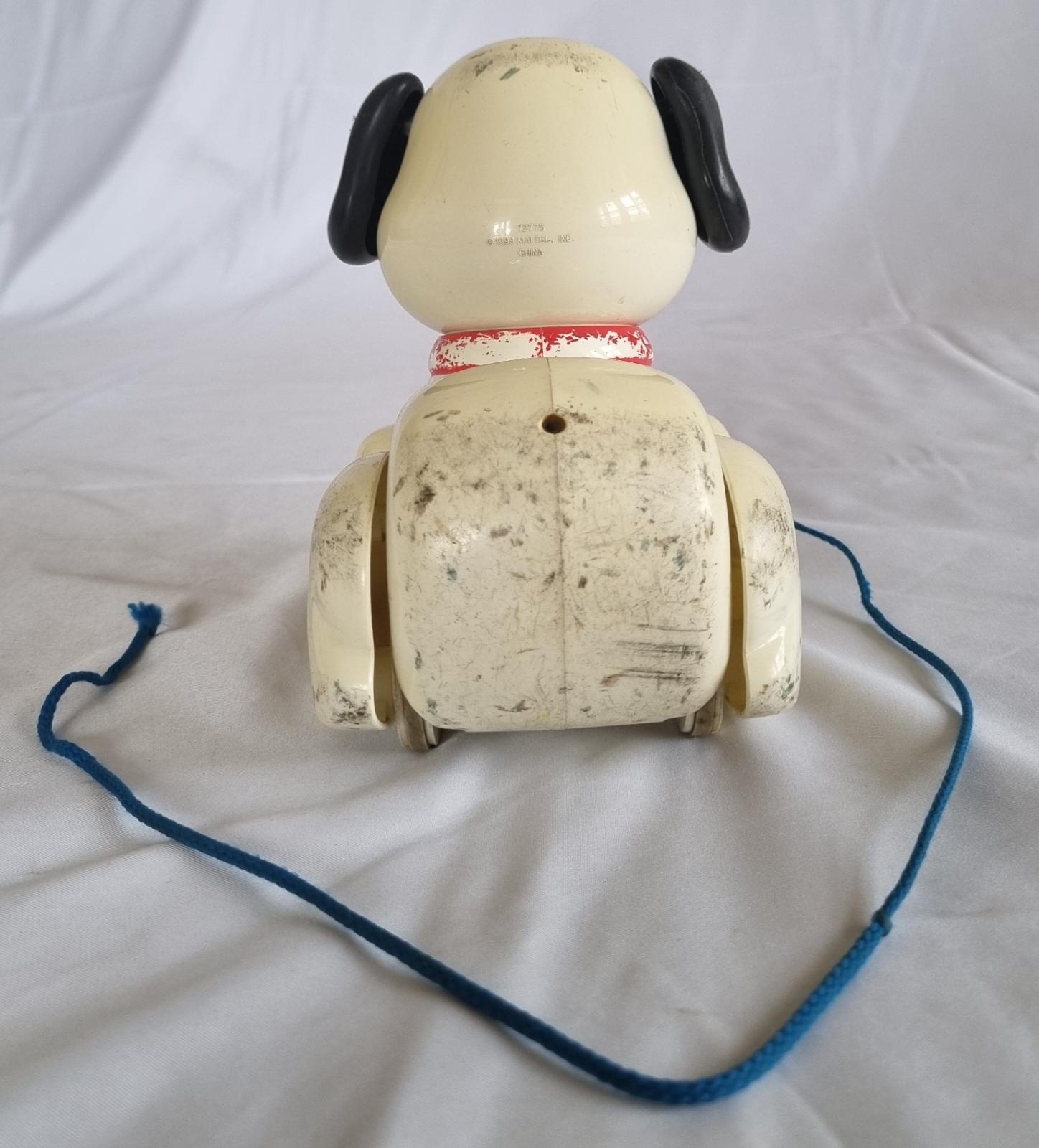 26-246 Pulling toy dog photo with background back view.