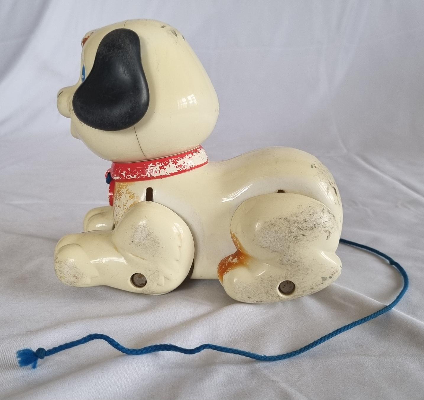 26-246 Pulling toy dog photo with background side view.