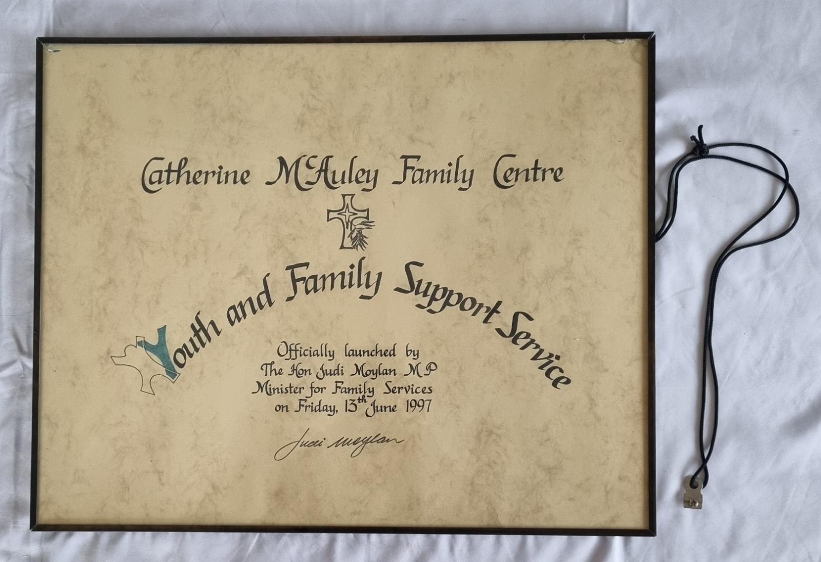 26-248 Catherine McAuley Family Centre - Youth and Family Support Services Signage photo with background front view.