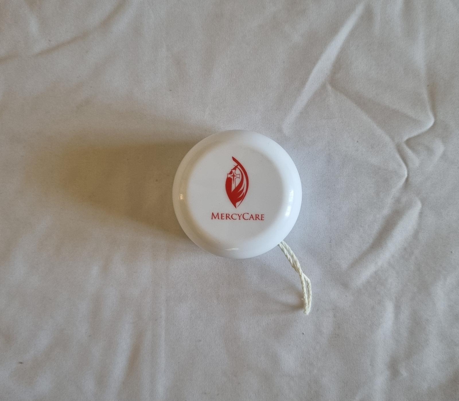 26-251.2 Yoyo with MercyCare Old Logo photo with background top-view.