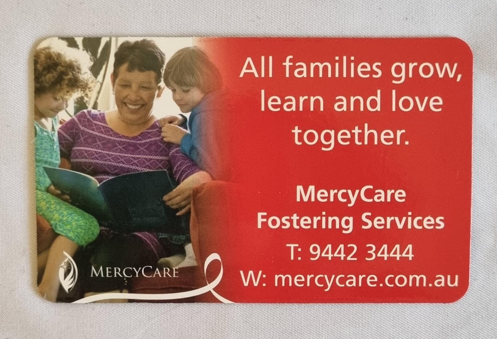 26-251.10 MercyCare Business Card photo with background. 