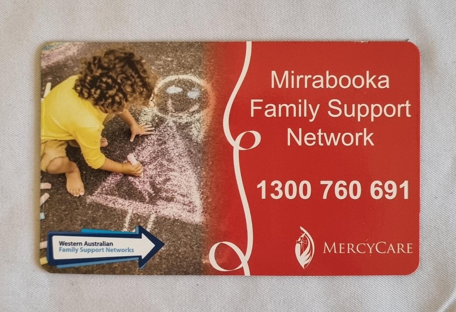 26-251.11 MercyCare Business Card photo with background front-view.