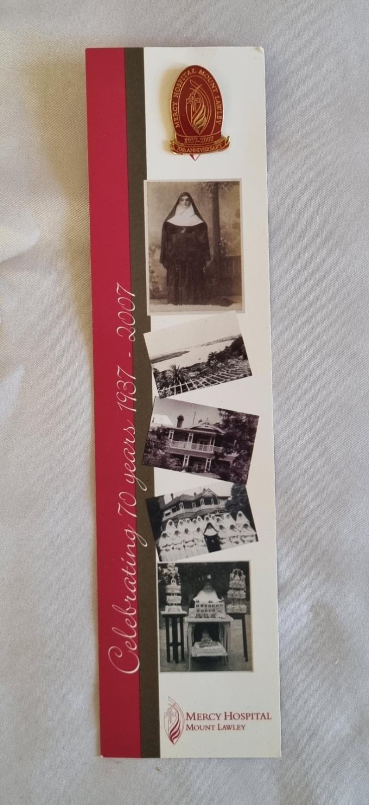 26-255 Mercy Hospital Mount Lawley 70th anniversary badge photo with background front-view.