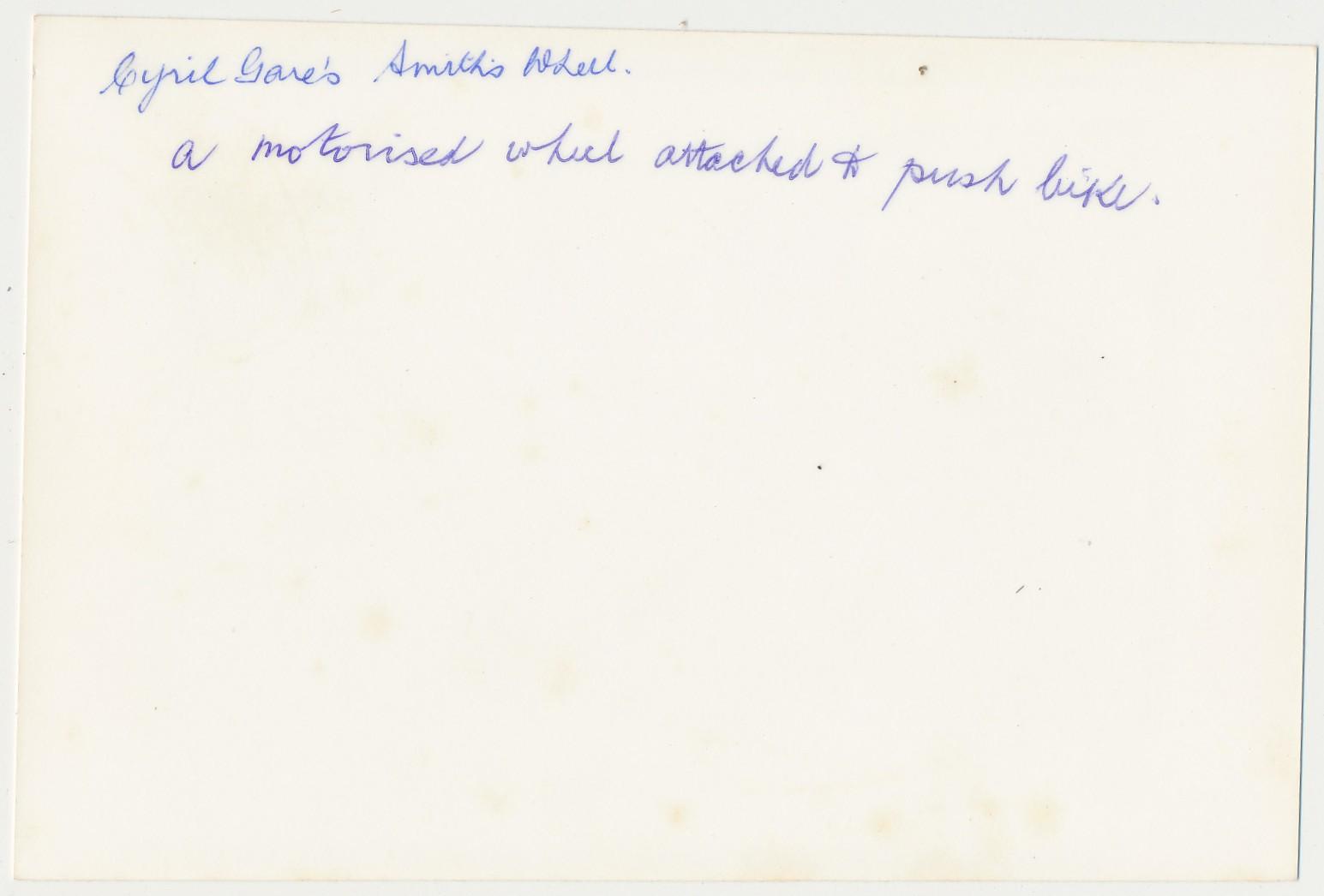 Back of photograph of Bicycle