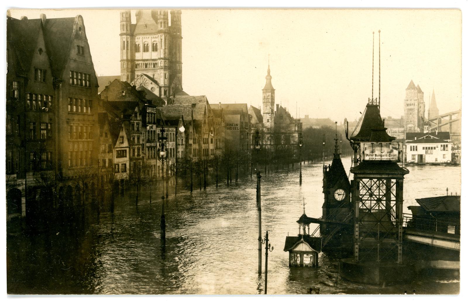 Photographic postcard showing flooding along Rhine river, Cologne, Germany.