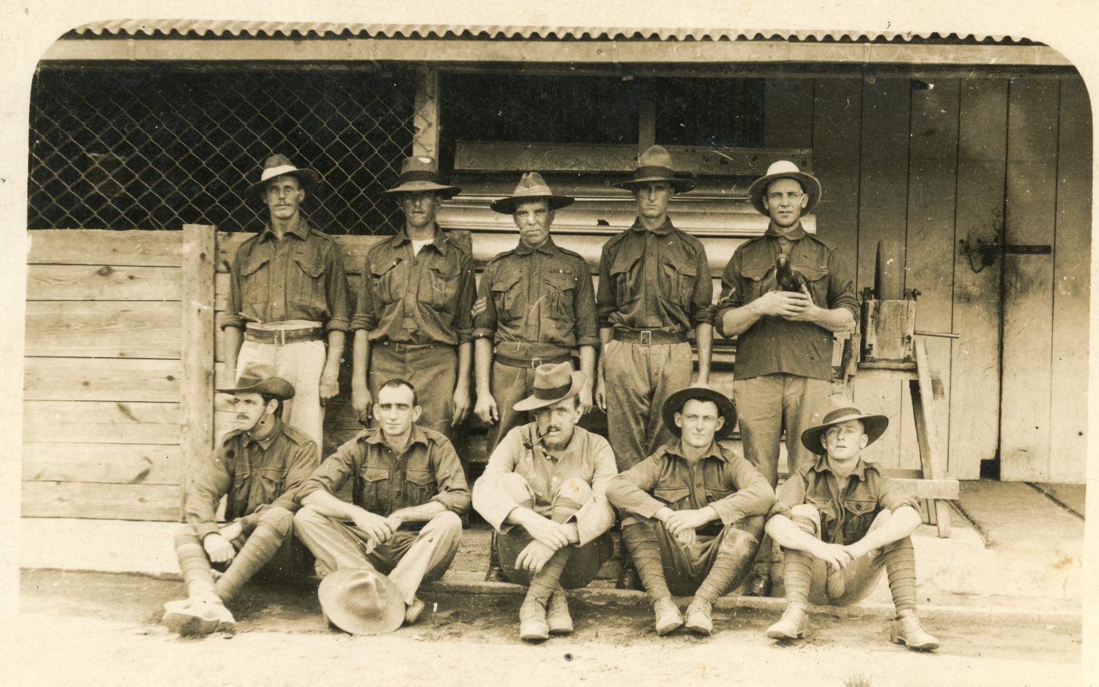 Postcard photo showing 10 soldiers from Transport Section in Rabaul 1914.