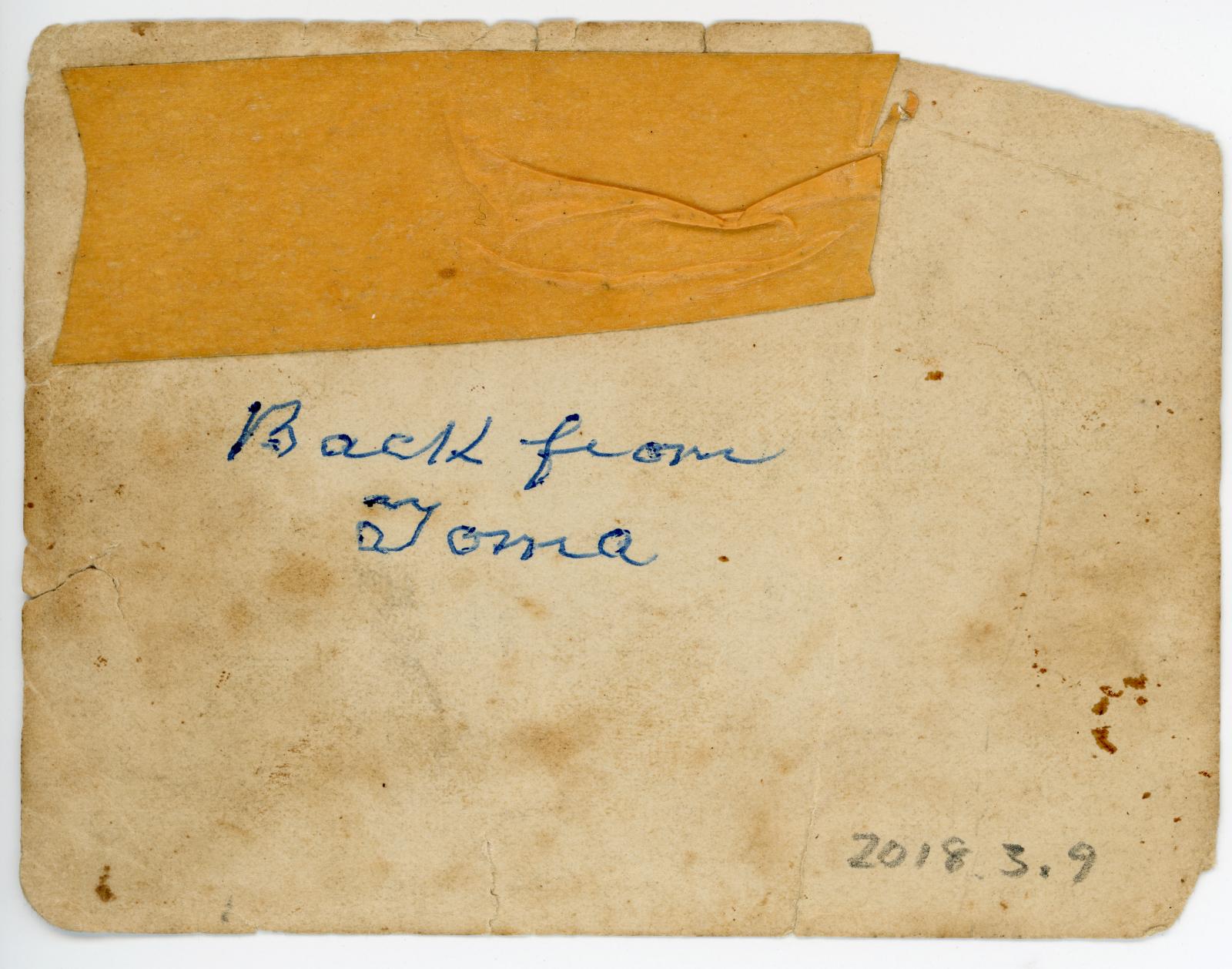 Rear view of photograph showing inscription.