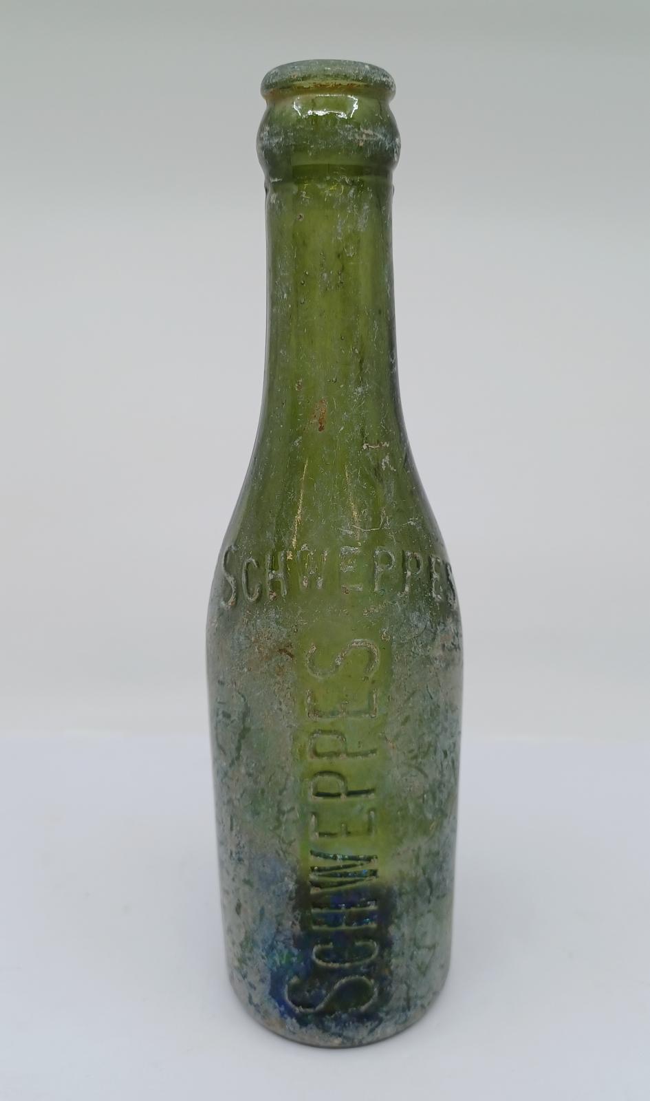 Green glass bottle - schweppes