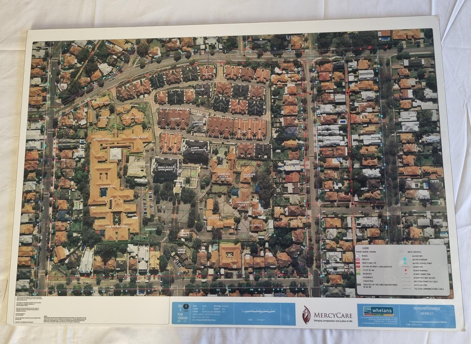 26-261.2 Aerial view/plan of the MercyCare Wembley Campus photo with background front-view.