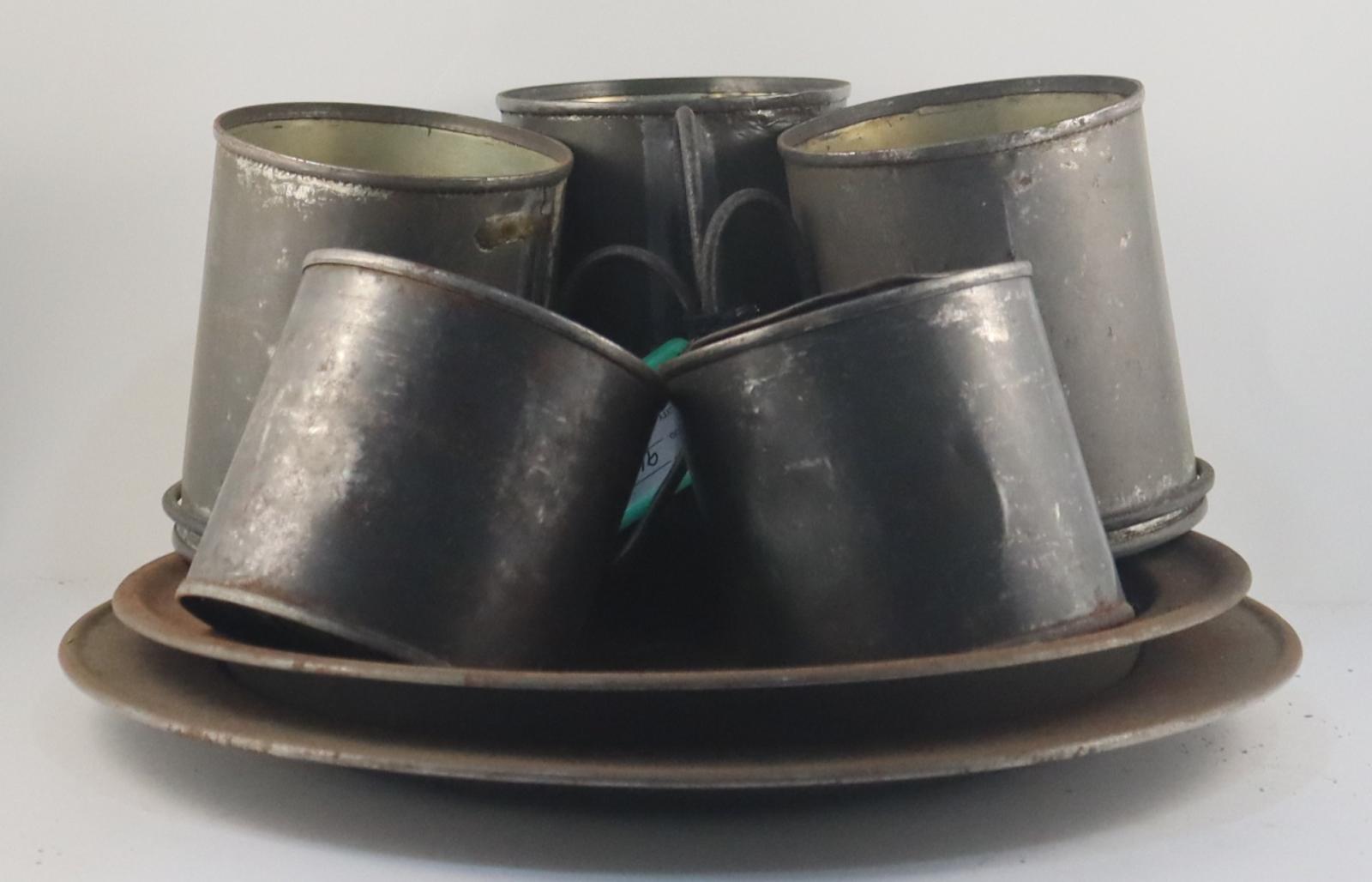 Side view of Tin Mugs and Plates