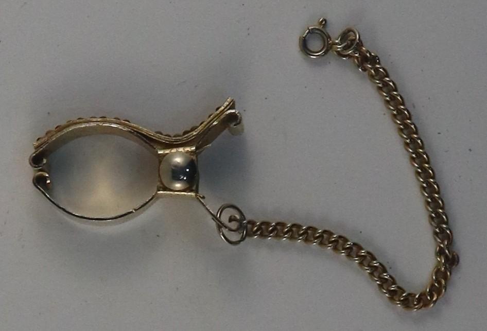 Side view of Handbag or Glove Clasp