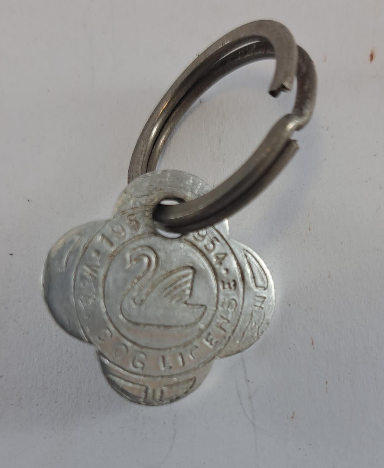 silver dog tag