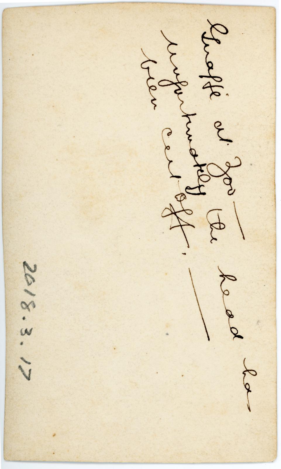 Rear view of photo showing inscription.