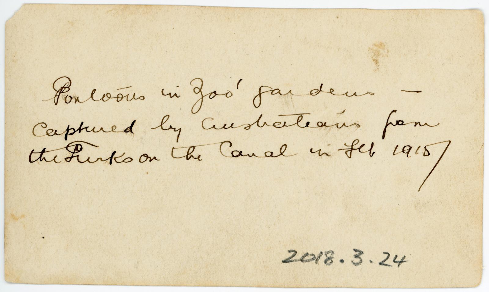 Rear view of photo showing inscription.