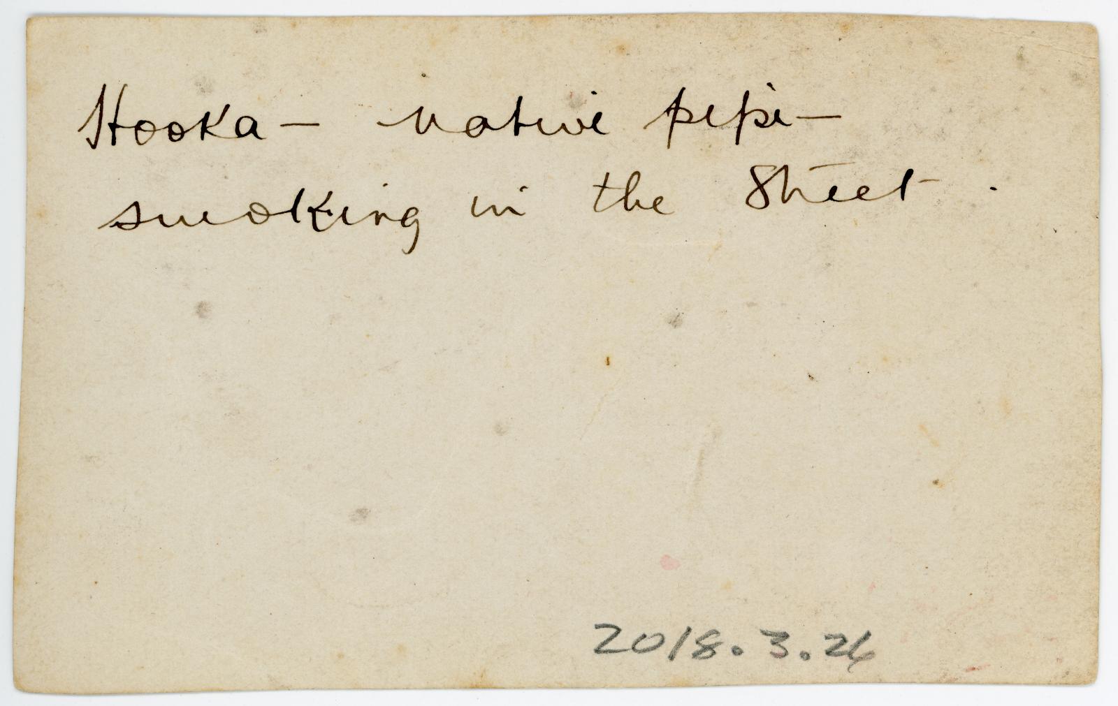 Rear view showing inscription.