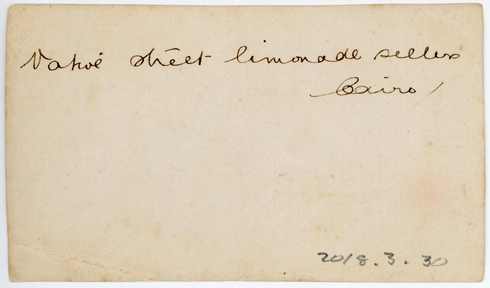 Rear view of photo showing inscription.
