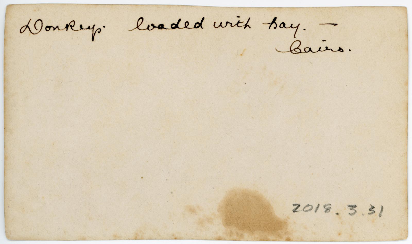 Rear view showing inscription.