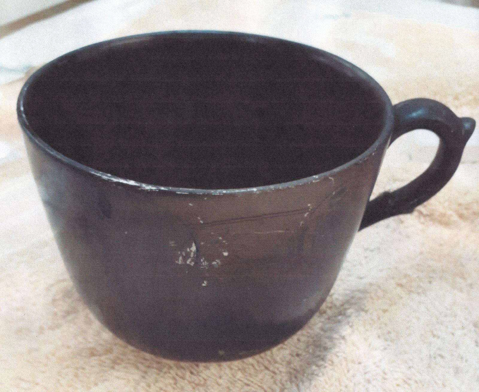 The Farmers Arms cup - fire damage