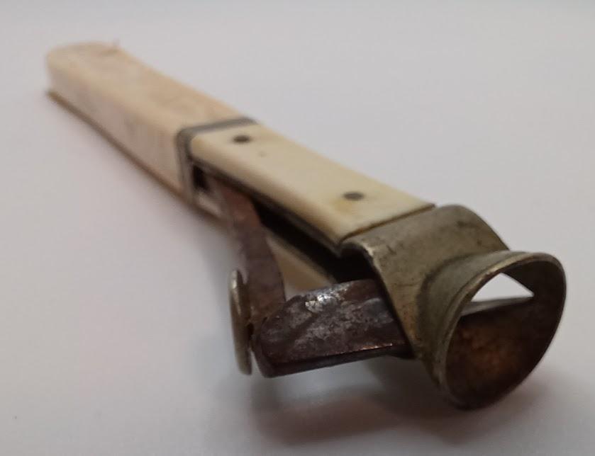 Handheld Cigar Cutter