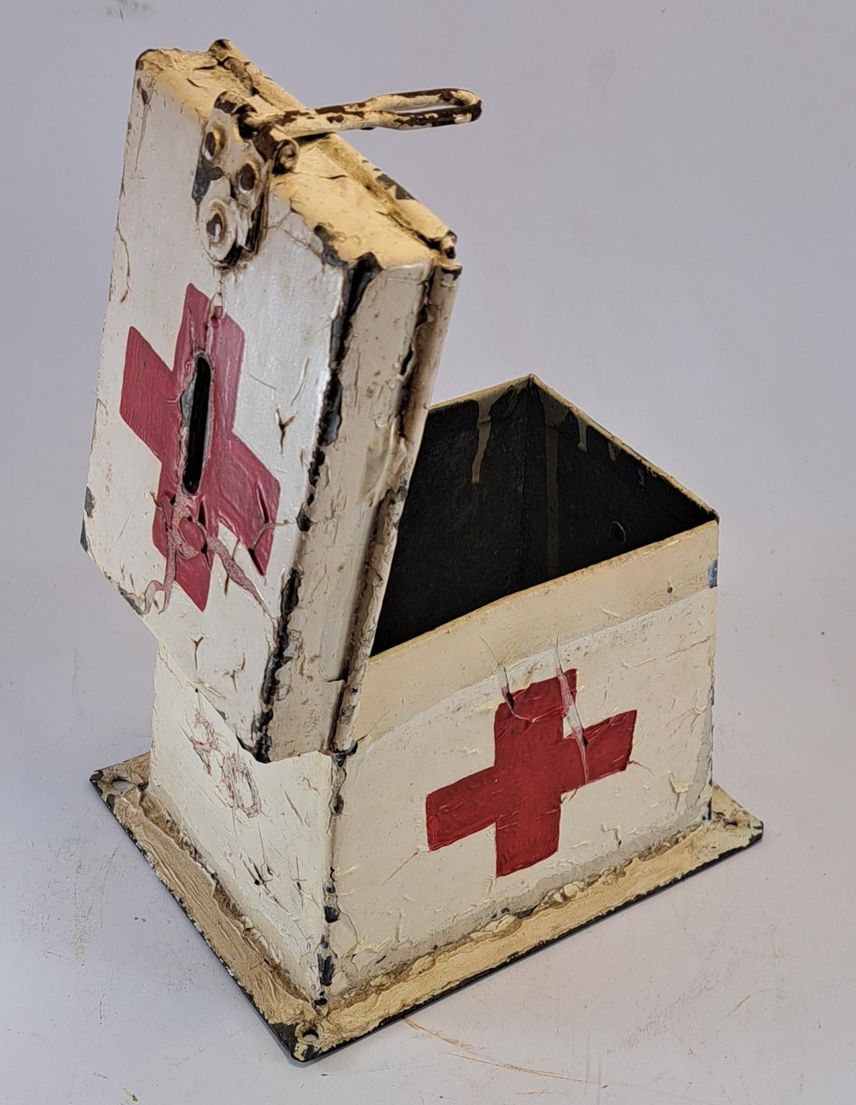 21.12 red cross donation tin 