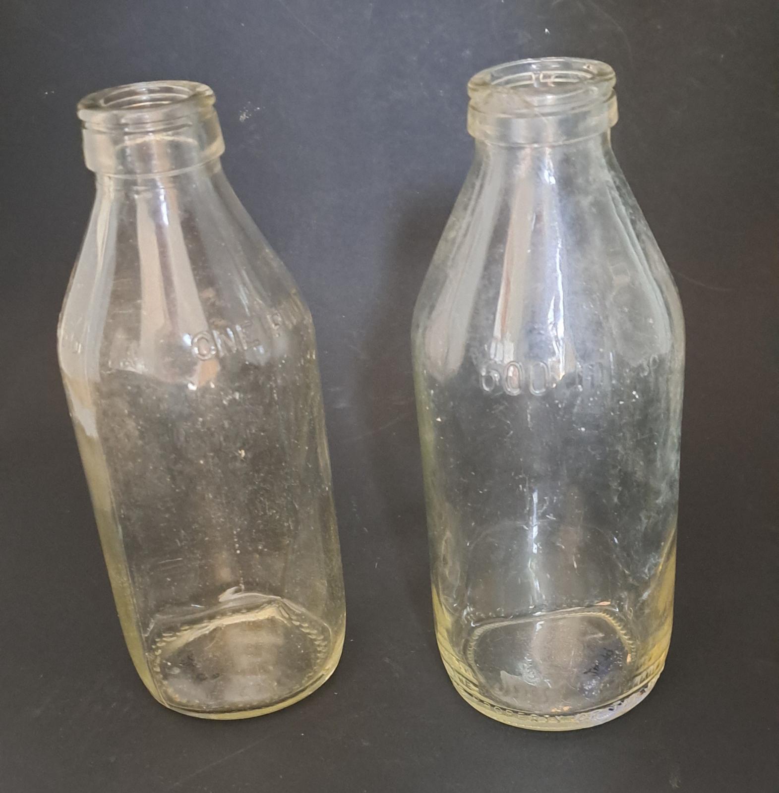 24.79 a,b milk bottles 