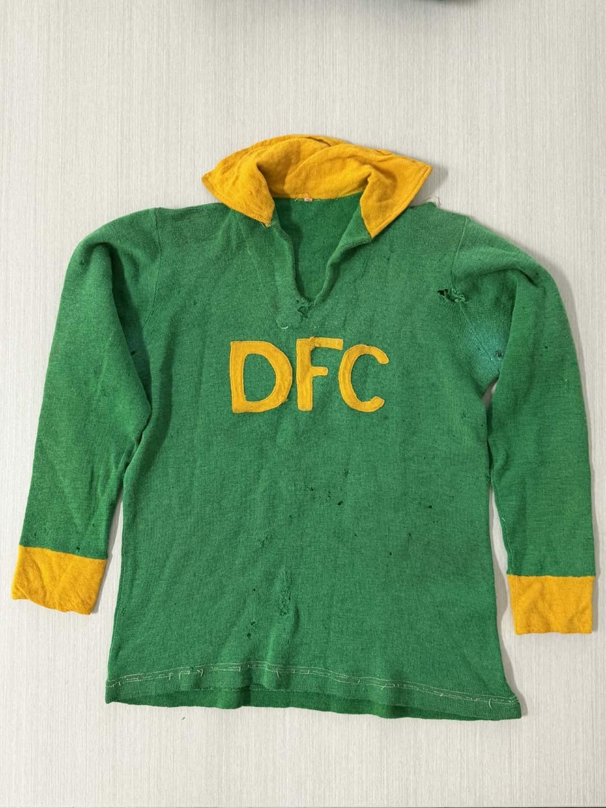 Green guernsey with golf cuffs and collar