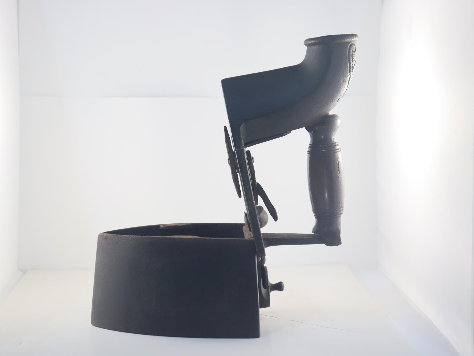 Side view of open Charcoal Iron