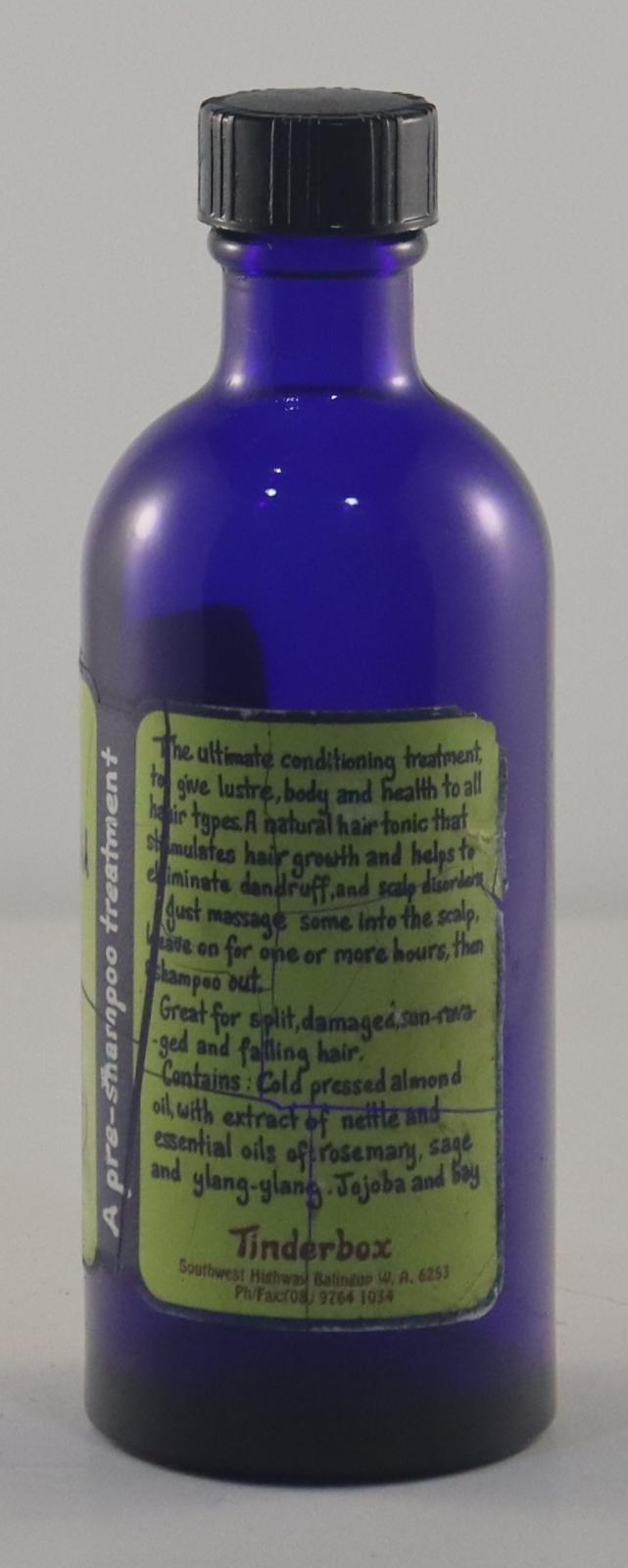 Back view of Hair Conditioning Oil Bottle