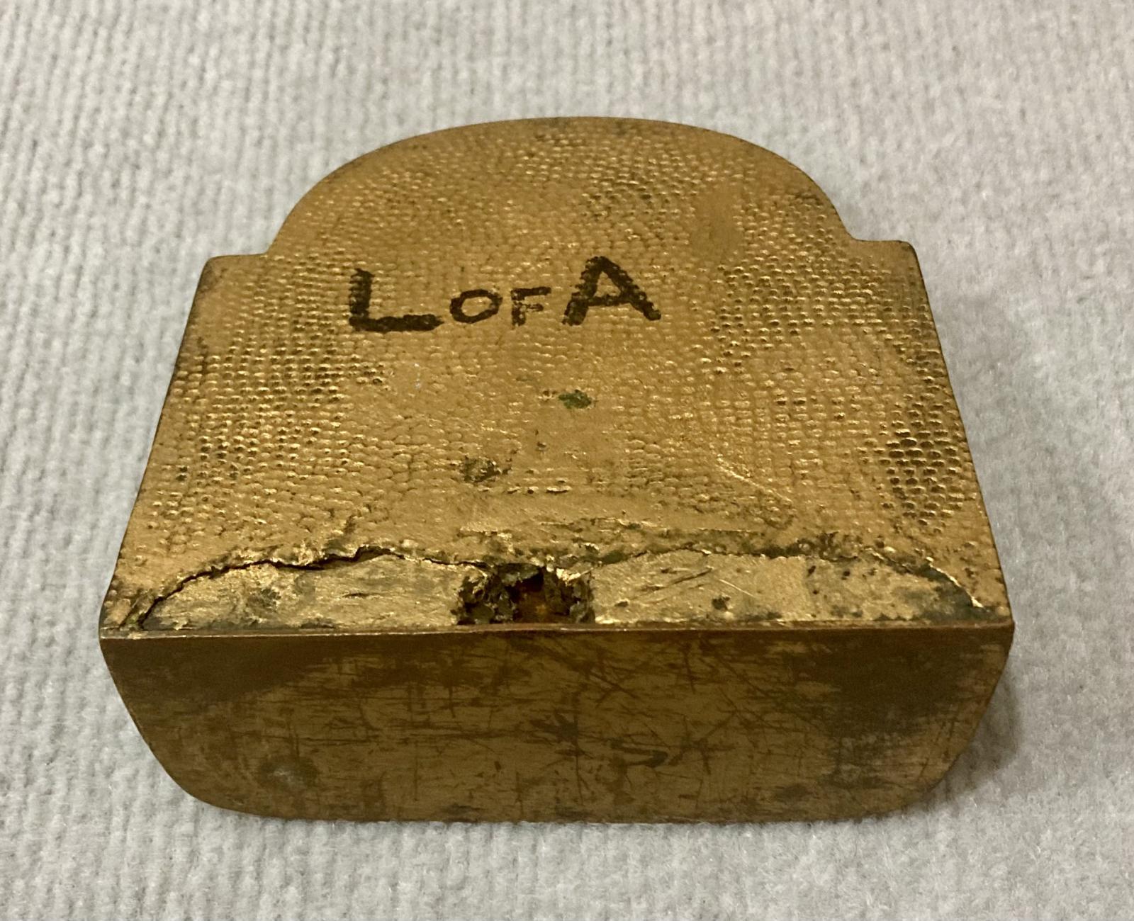 Painted metal book end featuring Lawrence of Arabia - view from below