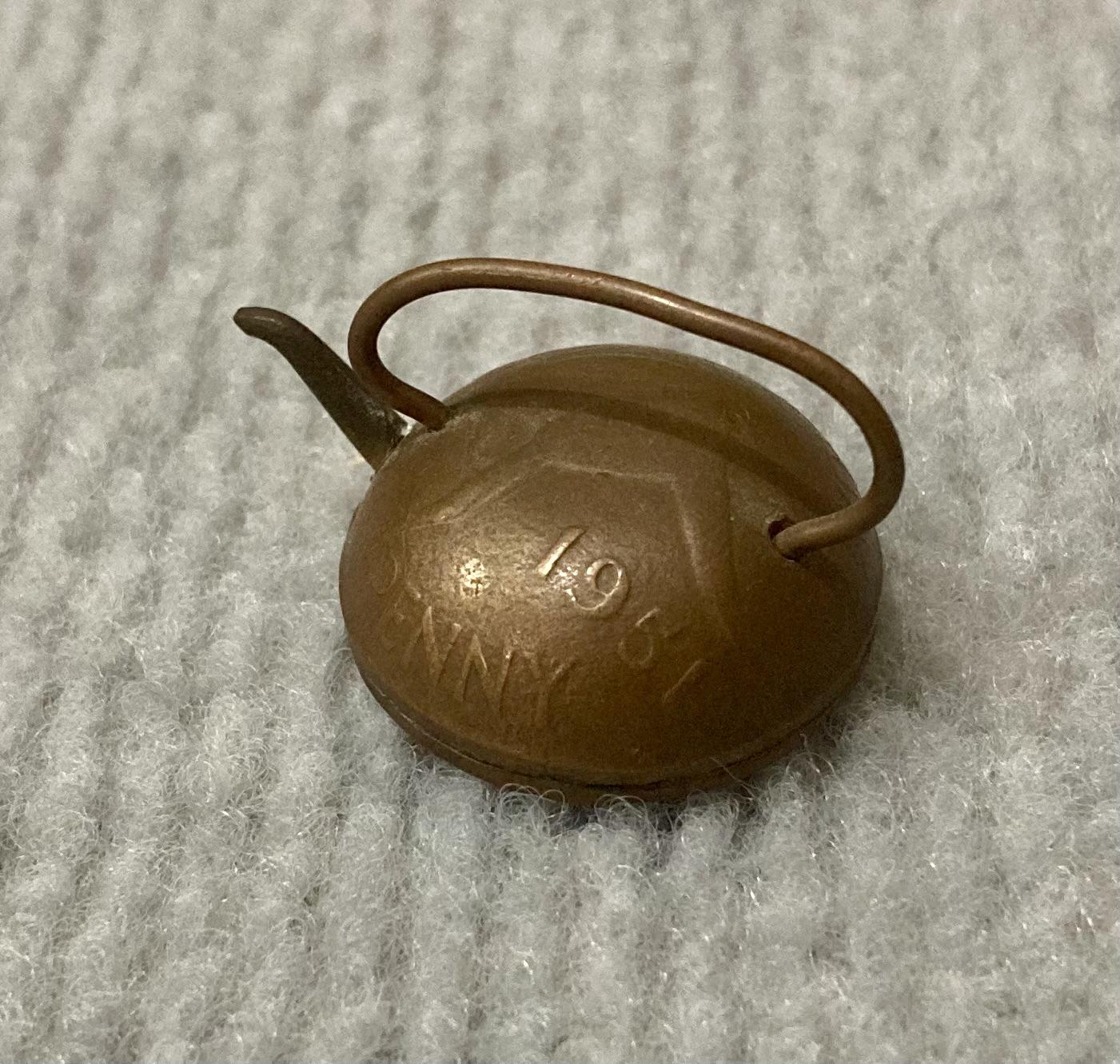 Other angled view of miniature tea kettle made from Australian coin