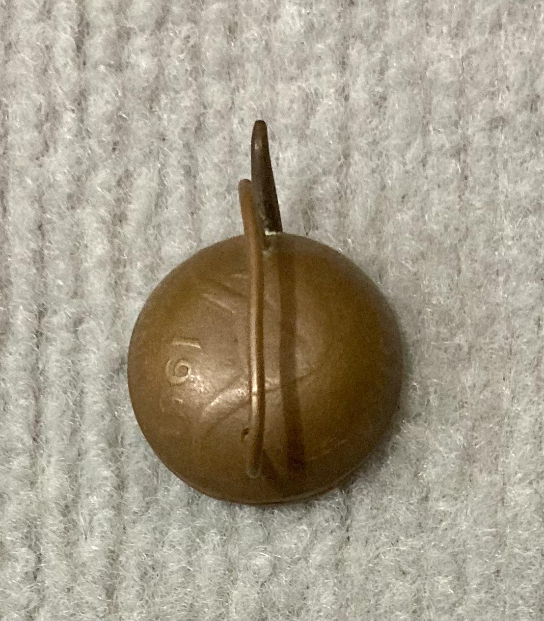 Miniature tea kettle made from Australian coin - view from above