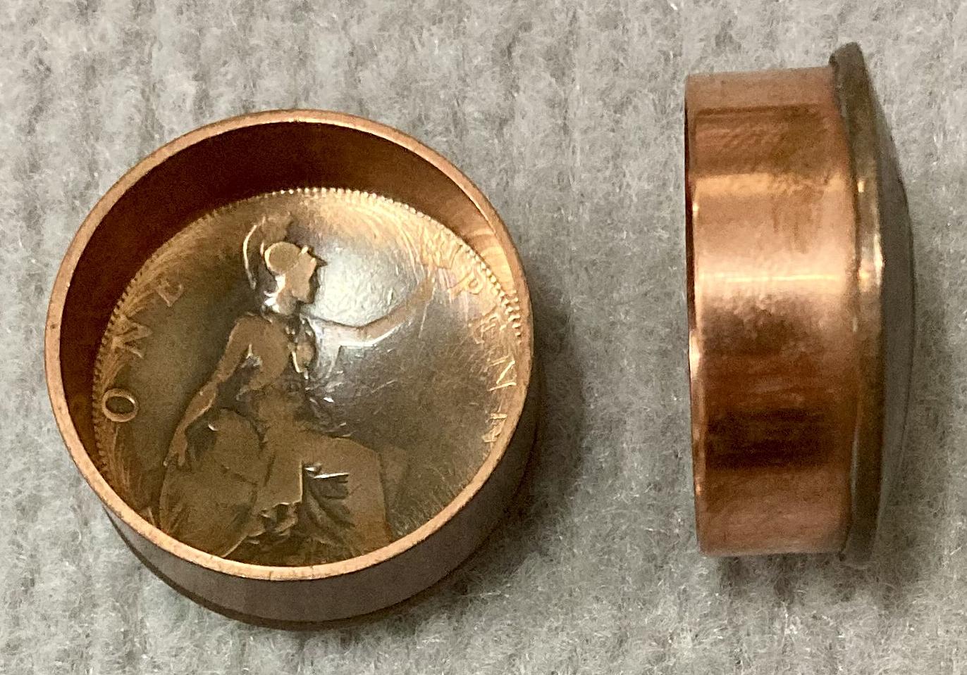 Circular snuff container made from coins - lid off