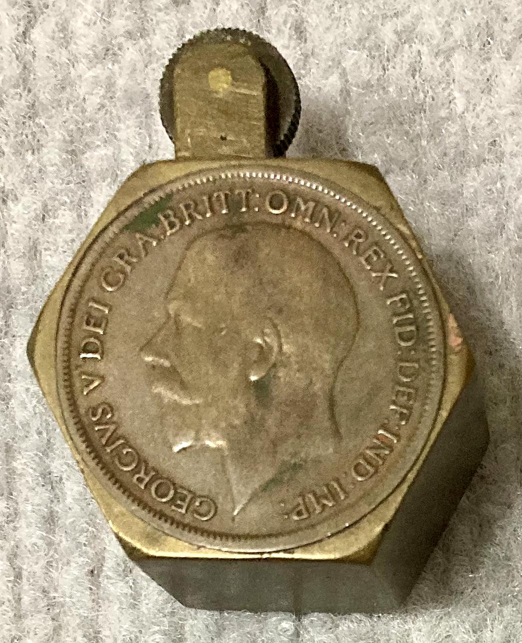 WWI era metal lighter decorated with two coins - other side view from above