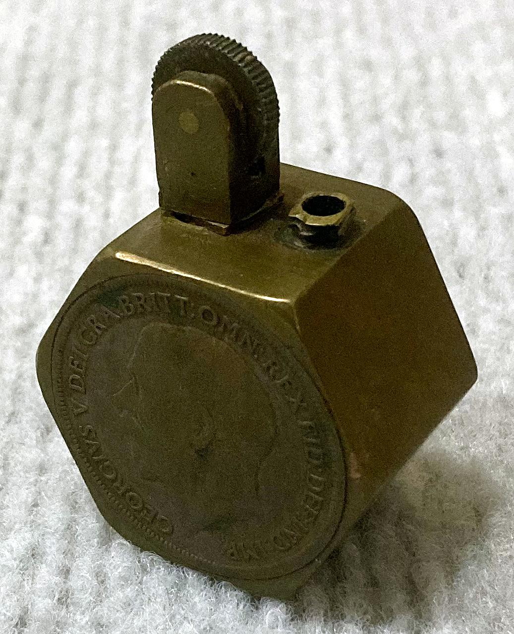 WWI era metal lighter decorated with two coins