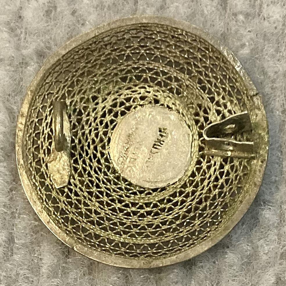 Reverse of WWI A.I.F. sterling silver filigree sweetheart Rising Sun badge