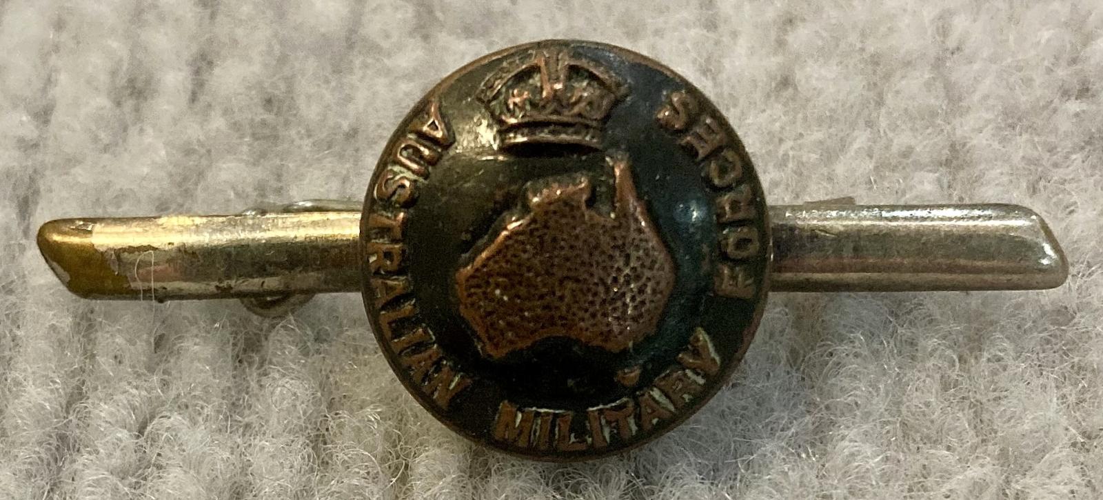 Tie pin/brooch made with Australian Military Forces button