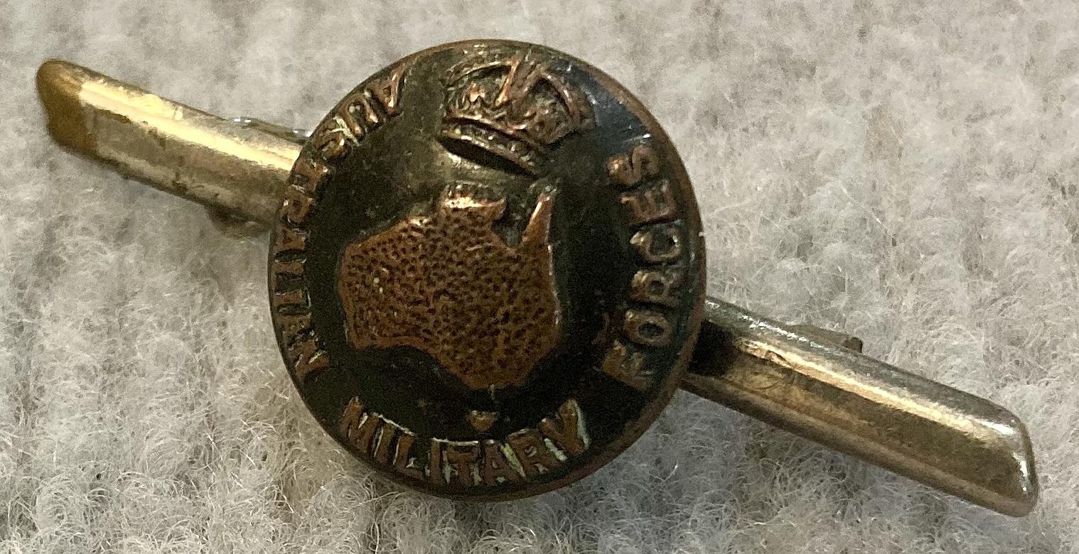 Angled view of tie pin/brooch made with Australian Military Forces button