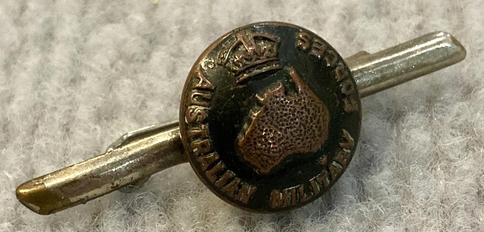 Other angled view of tie pin/brooch made with Australian Military Forces button