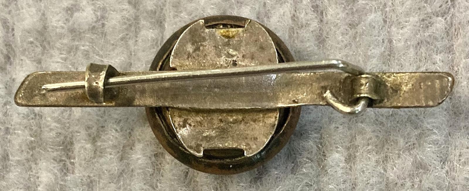 Reverse of tie pin/brooch made with Australian Military Forces button - pin closed