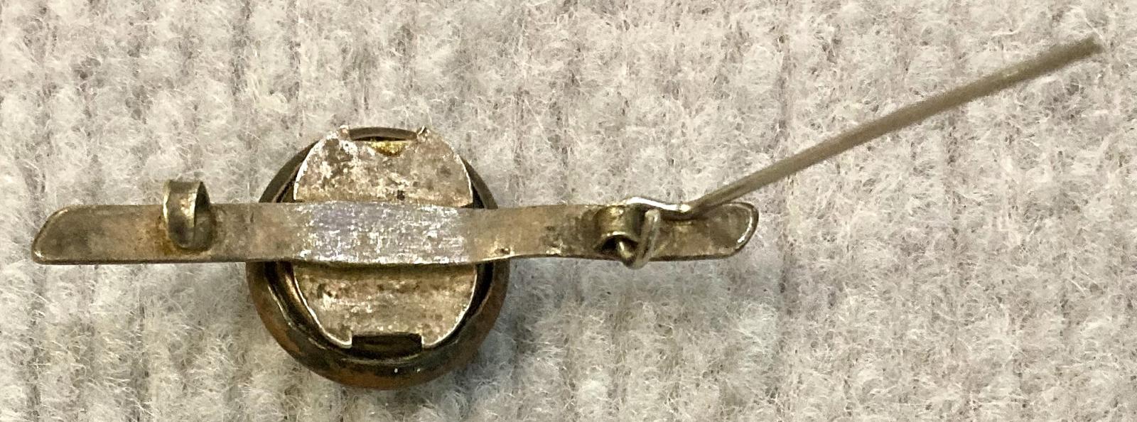 Reverse of tie pin/brooch made with Australian Military Forces button - pin open