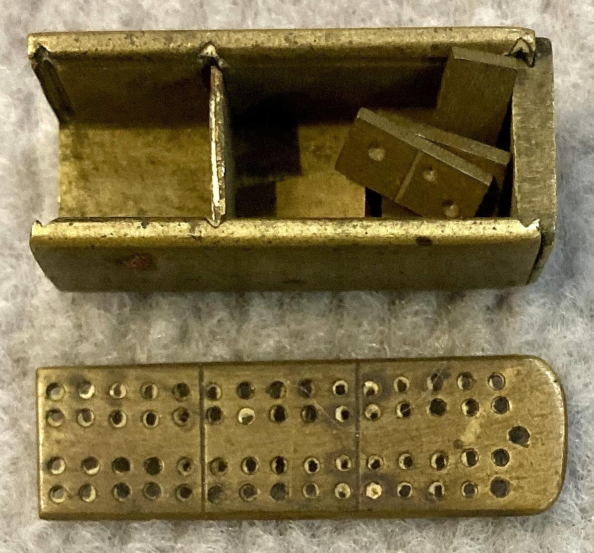 Trench art miniature domino set - box open, dominoes inside