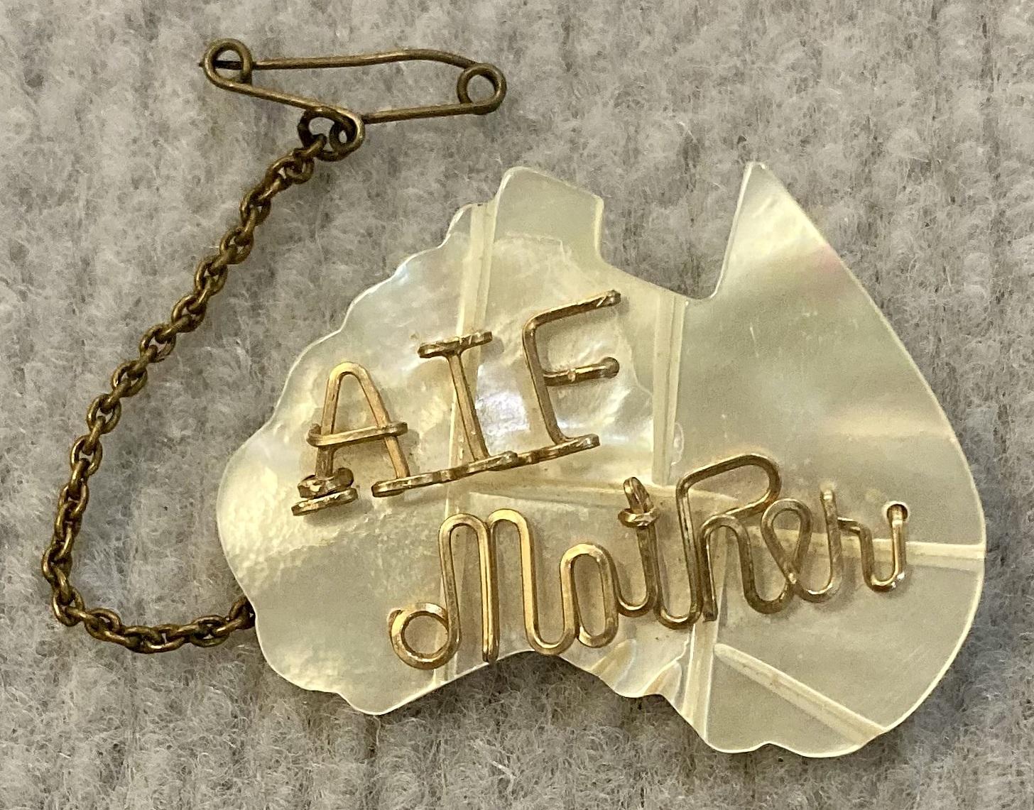 Mother of pearl A.I.F. sweetheart brooch with attached safety pin