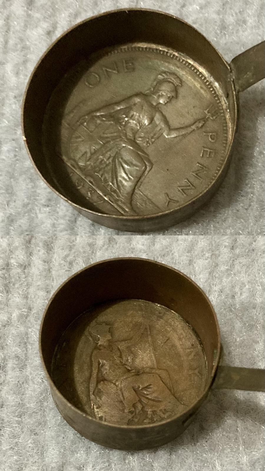 Miniature saucepans made from Australian coins - close up from top