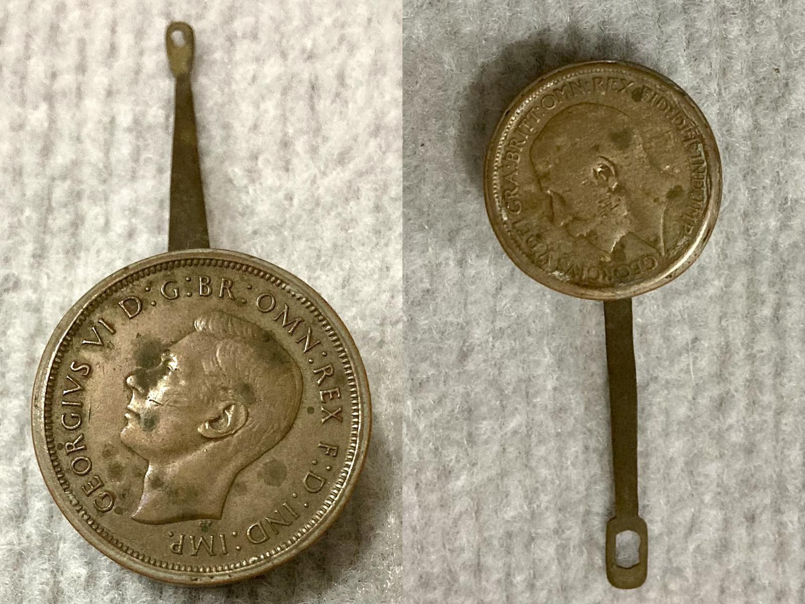 Miniature saucepans made from Australian coins - close-up from below