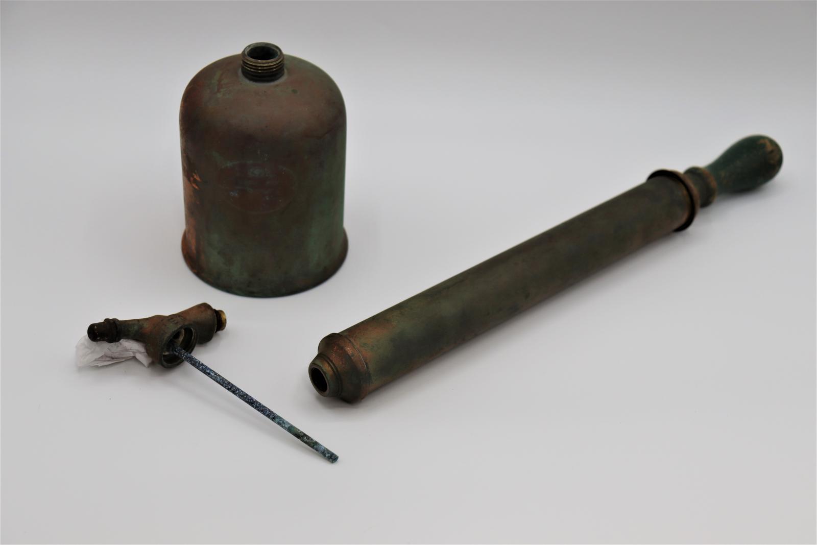 Apart of brass & copper hand pump garden or insect sprayer.