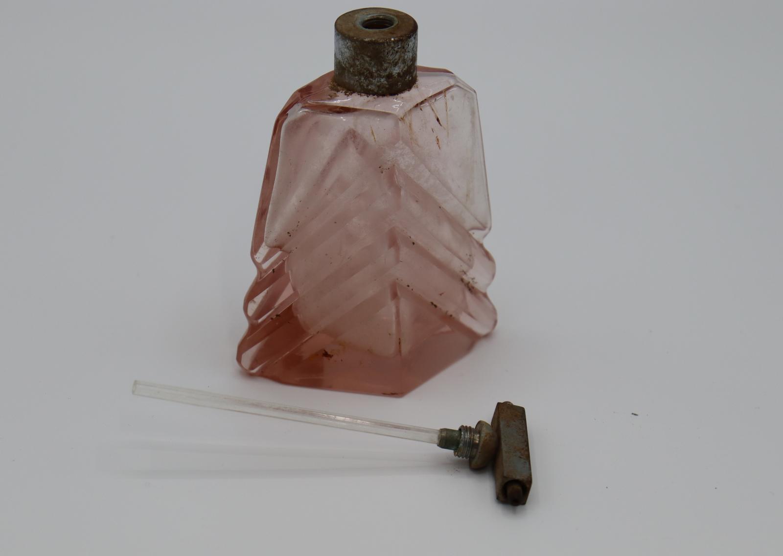 glass bottle and spay head