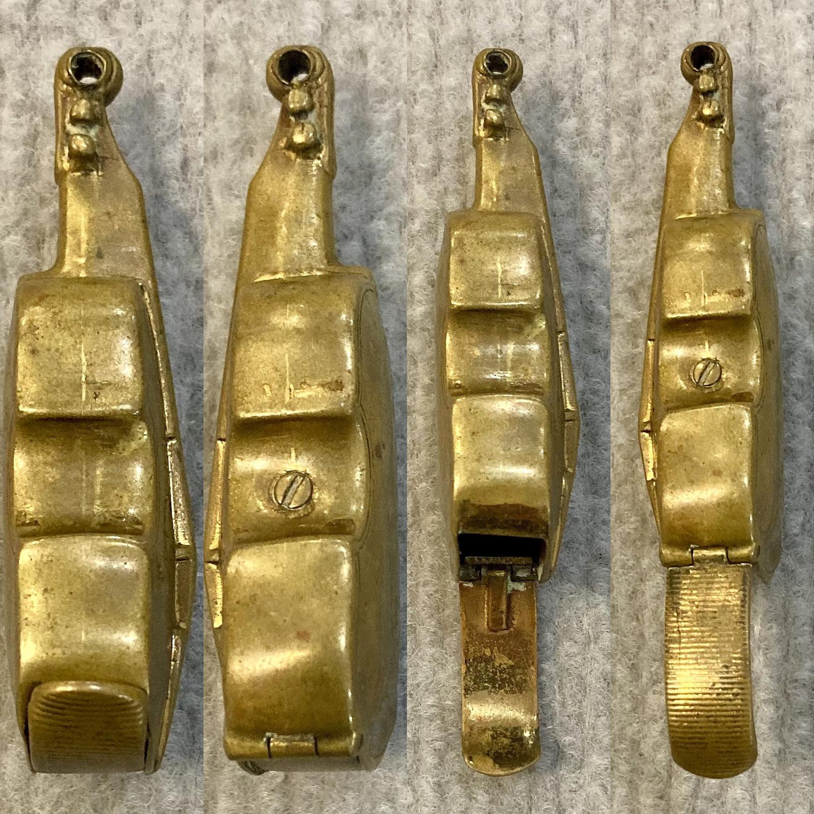 Antique brass vesta case in shape of violin showing side views with cover closed and open