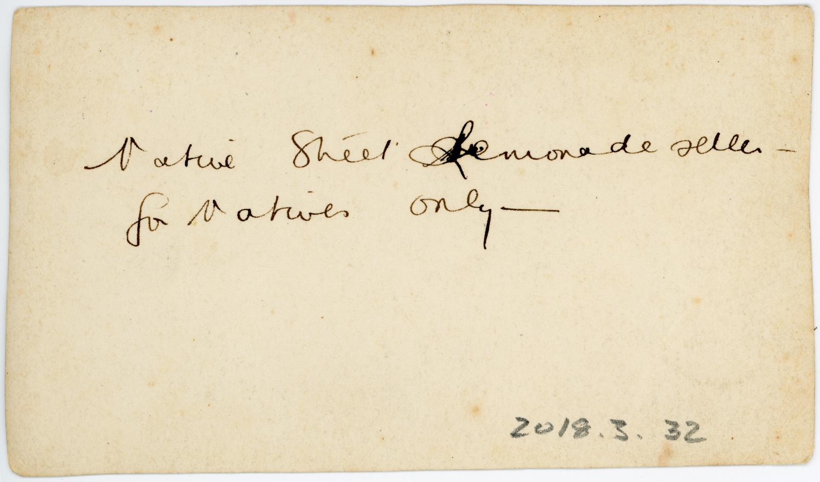 Rear view showing inscription.