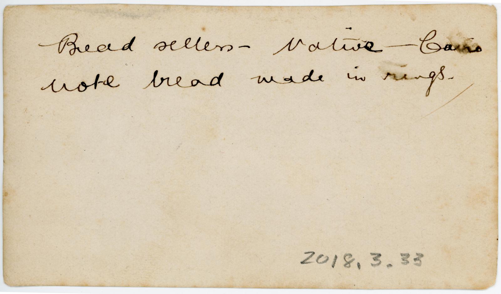 Rear view showing inscription.