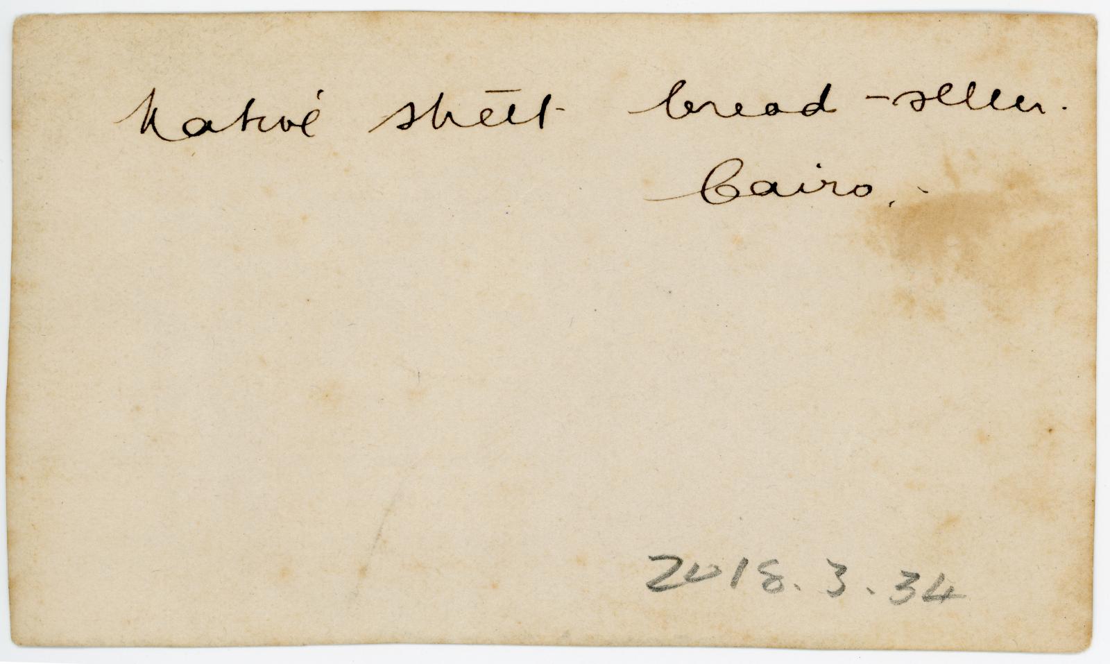 Rear view showing inscription.